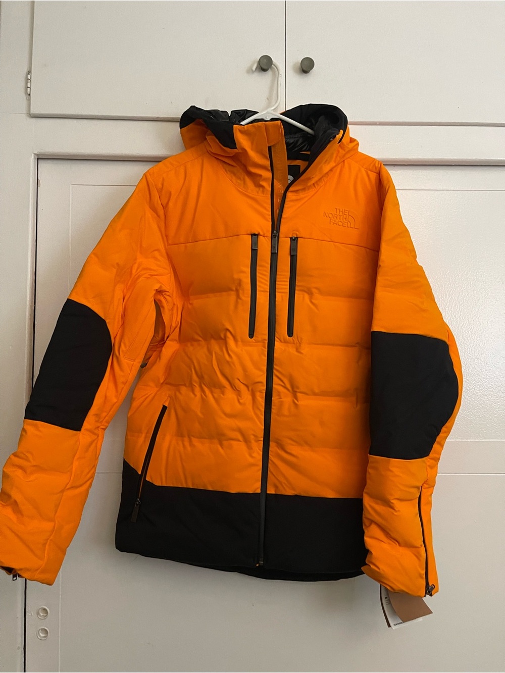 The North Face Men’s Orange and Black Hooded Puffer Jacket